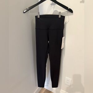 Lululemon- Wunder Train size 4 black team Canada leggings